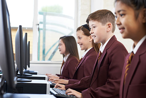 Students using computers in a classroom